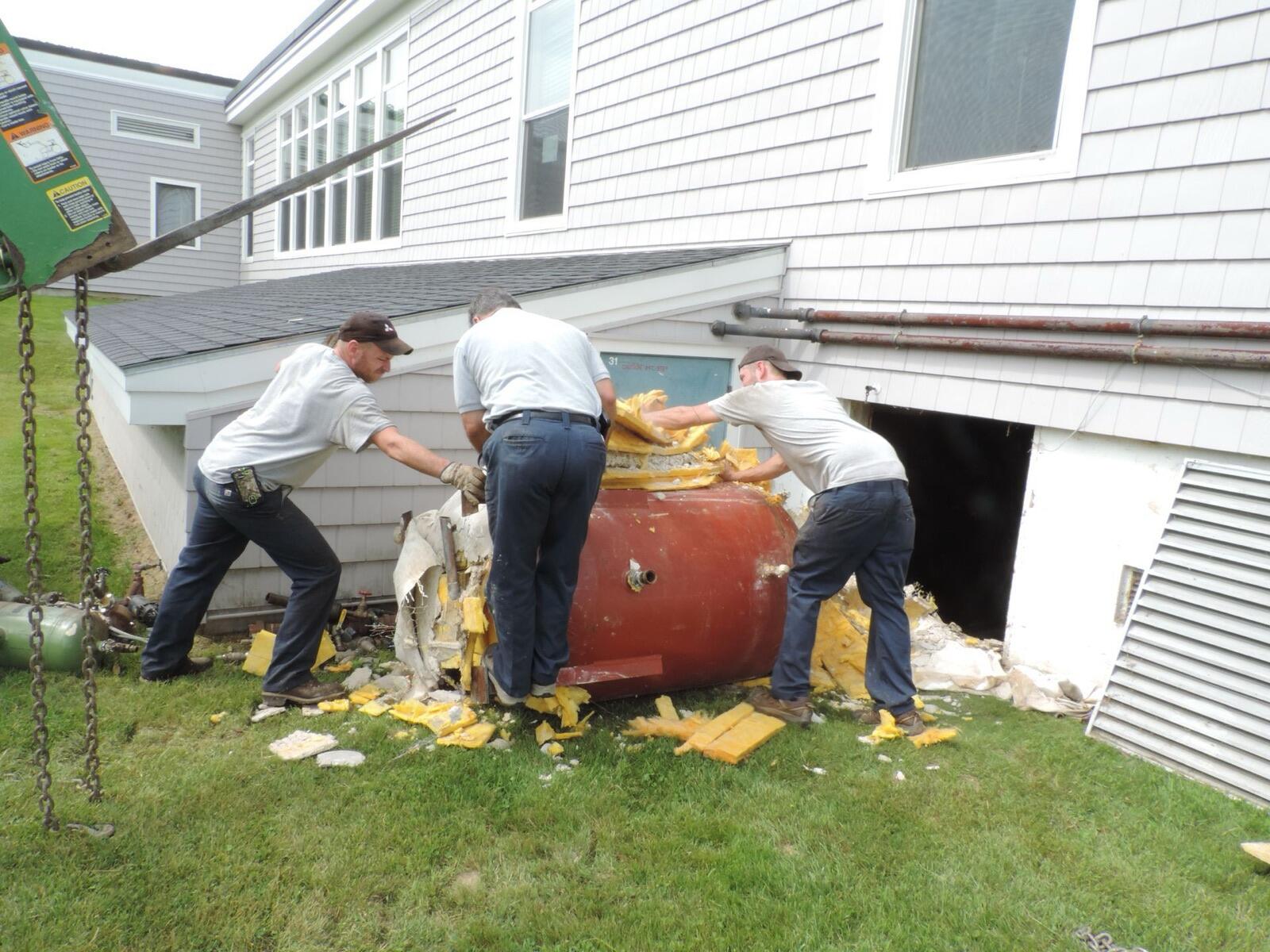 Removed domestic hot water tank from basement